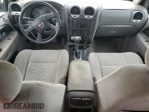2007 GMC Envoy SLE z VIN 1GKDT13SX72165911, wystawiony jako Copart lot #47059805 z przebiegiem 168 377 mil mil oraz Szkoda całkowita • Salvage title. Historia ofert i sprzedaży dostępna na DreamBid. Obrazek 8.
