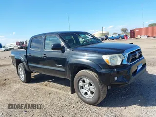 2015 Toyota Tacoma with VIN 3TMLU4EN2FM169326, listed as a IAAI auction lot 40689500 with 77,003 mi miles and . Bid and sale history available at DreamBid. Image 13.