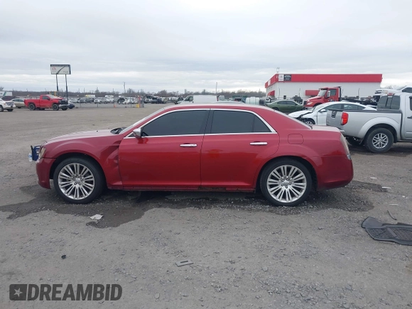 2012 Chrysler 300 Limited z VIN 2C3CCACG7CH250858, wystawiony jako IAAI lot #41709739 z przebiegiem 236 991 mil mil oraz . Historia ofert i sprzedaży dostępna na DreamBid. Obrazek 14.