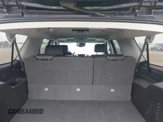2020 Chevrolet Suburban Premier with VIN 1GNSCJKC8LR290783, listed as a IAAI auction lot 42636126 with 59,371 mi miles and . Bid and sale history available at DreamBid. Image 8.