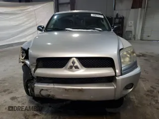 2007 Mitsubishi Raider LS z VIN 1Z7HT28KX7S216386, wystawiony jako Copart lot #88034315 z przebiegiem 162 337 mil mil oraz Czysty tytuł • Clean title. Historia ofert i sprzedaży dostępna na DreamBid. Obrazek 5.