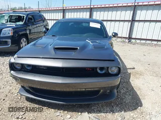 2020 Dodge Challenger R/T Scat Pack z VIN 2C3CDZFJ4LH230781, wystawiony jako IAAI lot #41990428 z przebiegiem 55 315 mil mil oraz . Historia ofert i sprzedaży dostępna na DreamBid. Obrazek 12.