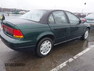 1996 Saturn SL with VIN 1G8ZK5277TZ293544, listed as a IAAI auction lot 41858643 with 189,450 mi miles and . Bid and sale history available at DreamBid. Image 4.