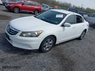 2012 Honda Accord Sdn SE with VIN 1HGCP2F65CA087796, listed as a IAAI auction lot 42021553 with 252,639 mi miles. Bid and sale history available at carsss.com. Image 2.