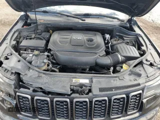 2018 Jeep Grand Cherokee High Altitude with VIN 1C4RJFCG6JC229685, listed as a Copart auction lot 50161555 with 151,176 mi miles and Salvage title. Bid and sale history available at DreamBid. Image 12.