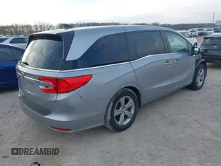 2018 Honda Odyssey EX-L z VIN 5FNRL6H72JB045639, wystawiony jako IAAI lot #41821993 z przebiegiem 60 737 mil mil oraz . Historia ofert i sprzedaży dostępna na DreamBid. Obrazek 4.