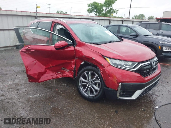 2021 Honda CR-V Touring with VIN 2HKRW2H9XMH663315, listed as a IAAI auction lot 42188893 with 26,203 mi miles and . Bid and sale history available at DreamBid. Image 1.