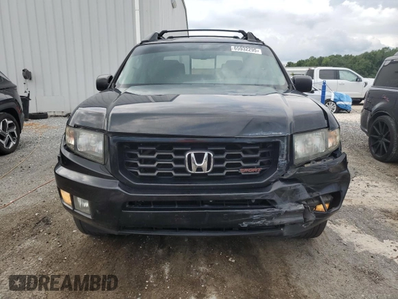 2014 Honda Ridgeline Sport with VIN 5FPYK1F75EB001197, listed as a Copart auction lot 65932295 with 121,862 mi miles and Salvage title. Bid and sale history available at DreamBid. Image 5.