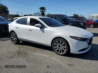 2019 Mazda 3 Preferred with VIN 3MZBPADL9KM105583, listed as a Copart auction lot 48248385 with 36,420 mi miles and Salvage Title. Bid and sale history available at DreamBid. Image 4.