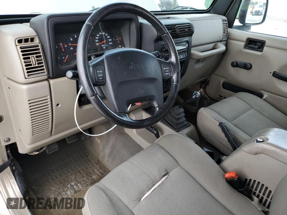 2003 Jeep Wrangler Sahara with VIN 1J4FA59S13P312830, listed as a Copart auction lot 52730955 with 99,247 mi miles and Salvage title. Bid and sale history available at DreamBid. Image 8.