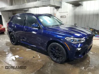 2020 BMW X5 M50i with VIN 5UXJU4C05LL227875, listed as a Copart auction lot 43477225 with 103,526 mi miles and Clean Title. Bid and sale history available at DreamBid. Image 4.