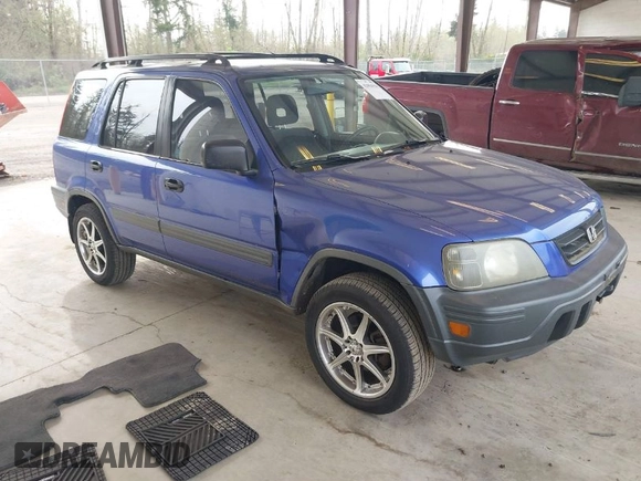 2001 Honda CR-V LX with VIN JHLRD28451C005857, listed as a IAAI auction lot 42004556 with 211,403 mi miles. Bid and sale history available at carsss.com. Image 1.