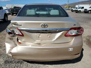 2011 Toyota Corolla L with VIN 2T1BU4EEXBC662749, listed as a Copart auction lot 84761994 with 66,697 mi miles and Salvage Title. Bid and sale history available at carsss.com. Image 6.