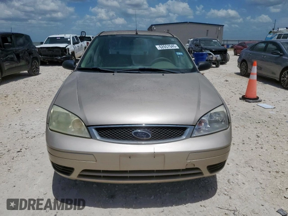 2006 Ford Focus S with VIN 1FAFP34N26W225772, listed as a Copart auction lot 62657045 with 117,078 mi miles and Salvage title. Bid and sale history available at DreamBid. Image 5.