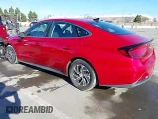 2020 Hyundai Sonata Hybrid Blue with VIN KMHL24JJ1LA009550, listed as a IAAI auction lot 41265226 with 85,347 mi miles. Bid and sale history available at carsss.com. Image 3.