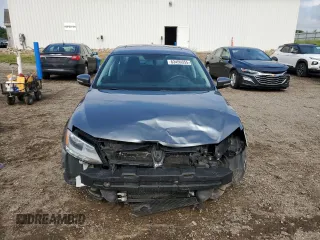 2014 Volkswagen Jetta TDI w/Premium with VIN 3VWLL7AJ6EM428743, listed as a Copart auction lot 63459355 with 145,814 mi miles and Salvage title. Bid and sale history available at DreamBid. Image 5.