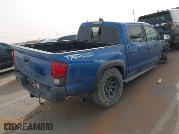 2018 Toyota Tacoma SR with VIN 3TMCZ5AN1JM124111, listed as a IAAI auction lot 41741973 with 90,175 mi miles. Bid and sale history available at carsss.com. Image 4.