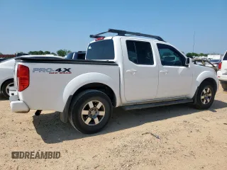 2012 Nissan Frontier Pro-4X with VIN 1N6AD0EV3CC468057, listed as a Copart auction lot 60432675 with 100,088 mi miles and Salvage title. Bid and sale history available at DreamBid. Image 3.