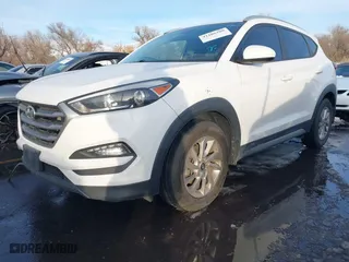 2017 Hyundai Tucson SE Plus with VIN KM8J33A44HU352769, listed as a IAAI auction lot 41106280 with 117,809 mi miles. Bid and sale history available at carsss.com. Image 2.