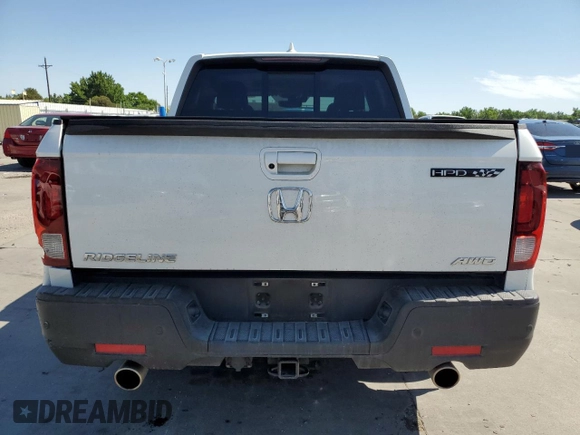 2023 Honda Ridgeline RTL-E with VIN 5FPYK3F76PB011963, listed as a Copart auction lot 63079165 with 25,658 mi miles and Salvage title. Bid and sale history available at DreamBid. Image 6.
