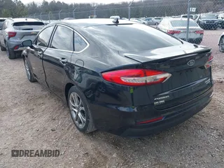 2019 Ford Fusion Hybrid Titanium with VIN 3FA6P0RU4KR144445, listed as a IAAI auction lot 42059840 with 90,617 mi miles. Bid and sale history available at carsss.com. Image 3.