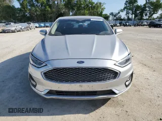 2019 Ford Fusion Titanium with VIN 3FA6P0RU1KR209297, listed as a Copart auction lot 54358065 with 122,600 mi miles and Salvage Title. Bid and sale history available at DreamBid. Image 5.
