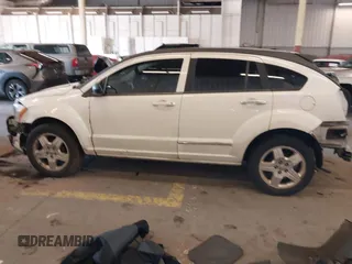 2009 Dodge Caliber SXT with VIN 1B3HB48A89D116734, listed as a IAAI auction lot 41959281 with 209,136 mi miles and . Bid and sale history available at DreamBid. Image 15.