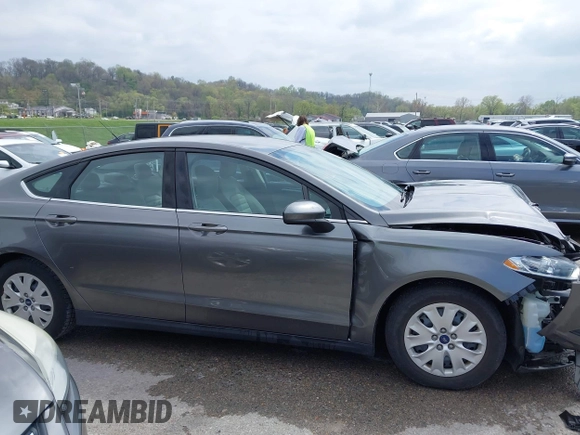 2014 Ford Fusion S with VIN 3FA6P0G70ER377725, listed as a IAAI auction lot 42007410 with 56,552 mi miles and . Bid and sale history available at carsss.com. Image 14.