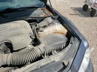 2018 Chrysler 300 Touring с VIN 2C3CCARG2JH325017, выставлен на аукционе Copart как лот 70126575 с пробегом 60 743 миль миль и Списание • Salvage title. История ставок и продаж доступна на DreamBid. Изображение 13.