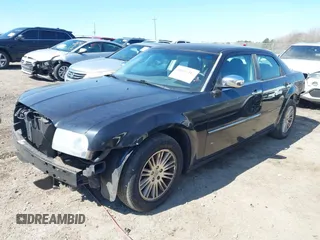 2010 Chrysler 300 Touring with VIN 2C3CA5CV4AH327906, listed as a IAAI auction lot 41633347 with 150,684 mi miles and . Bid and sale history available at DreamBid. Image 2.