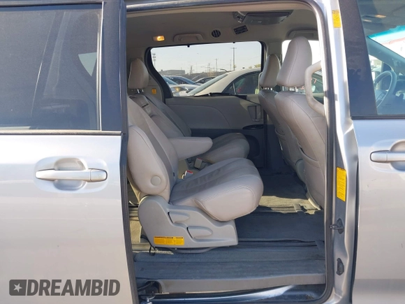 2013 Toyota Sienna LE AAS with VIN 5TDKK3DC6DS371126, listed as a IAAI auction lot 42006353 with 141,425 mi miles. Bid and sale history available at carsss.com. Image 8.