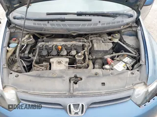 2007 Honda Civic Cpe LX with VIN 2HGFG12657H582102, listed as a IAAI auction lot 42030068 with 166,172 mi miles. Bid and sale history available at carsss.com. Image 10.