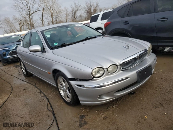 2005 Jaguar X-Type 3.0L with VIN SAJWA51A35WE55834, listed as a Copart auction lot 42930694 with NaN miles and Salvage Title. Bid and sale history available at carsss.com. Image 4.