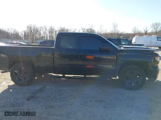 2016 Chevrolet Silverado 1500 Custom with VIN 1GCVKPEC2GZ259607, listed as a IAAI auction lot 41762877 with 105,944 mi miles. Bid and sale history available at carsss.com. Image 13.