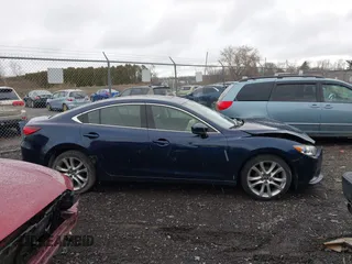 2017 Mazda Mazda6 Touring with VIN JM1GL1V59H1154440, listed as a IAAI auction lot 41078595 with 104,732 mi miles. Bid and sale history available at carsss.com. Image 14.
