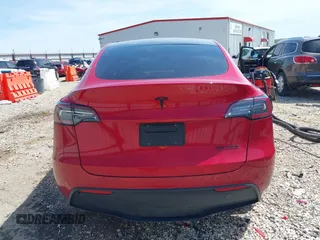 2020 Tesla Model Y Long Range z VIN 5YJYGDEE0LF034164, wystawiony jako IAAI lot #42080304 z przebiegiem 55 520 mil mil oraz . Historia ofert i sprzedaży dostępna na DreamBid. Obrazek 17.