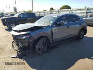 2023 Mazda CX-30 2.5 S Carbon Edition with VIN 3MVDMBCM5PM508471, listed as a Copart auction lot 87279944 with 29,756 mi miles and Non Repairable. Bid and sale history available at carsss.com. Image 1.