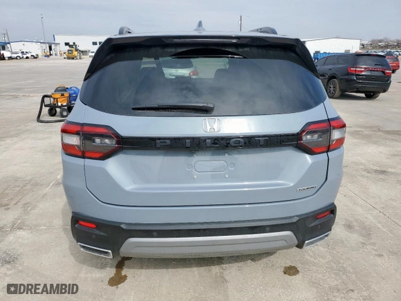 2025 Honda Pilot Touring with VIN 5FNYG2H78SB000571, listed as a Copart auction lot 45391595 with 6,916 mi miles and Salvage Title. Bid and sale history available at carsss.com. Image 6.