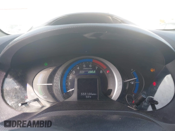 2010 Honda Insight EX with VIN JHMZE2H71AS032532, listed as a IAAI auction lot 41988221 with 333,144 mi miles and . Bid and sale history available at DreamBid. Image 7.