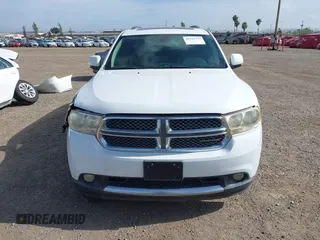 2013 Dodge Durango Crew with VIN 1C4SDHDT2DC679600, listed as a IAAI auction lot 42215737 with 128,499 mi miles and . Bid and sale history available at DreamBid. Image 12.