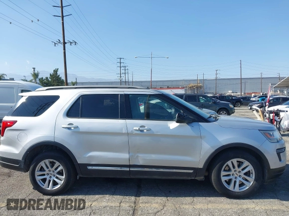 2018 Ford Explorer XLT z VIN 1FM5K7D84JGA81047, wystawiony jako IAAI lot #42216772 z przebiegiem 127 613 mil mil oraz . Historia ofert i sprzedaży dostępna na DreamBid. Obrazek 13.