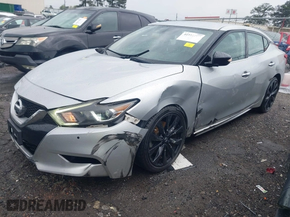 2017 Nissan Maxima SR with VIN 1N4AA6AP2HC396545, listed as a IAAI auction lot 41910588 with 142,661 mi miles and . Bid and sale history available at DreamBid. Image 17.