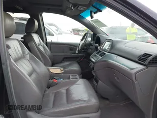2010 Honda Odyssey Touring with VIN 5FNRL3H95AB040354, listed as a IAAI auction lot 41889501 with 155,069 mi miles. Bid and sale history available at carsss.com. Image 5.