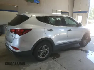 2017 Hyundai Santa Fe 2.4L z VIN 5XYZTDLB4HG440683, wystawiony jako Copart lot #55408975 z przebiegiem 105 014 mil mil oraz Szkoda całkowita • Salvage title. Historia ofert i sprzedaży dostępna na DreamBid. Obrazek 3.