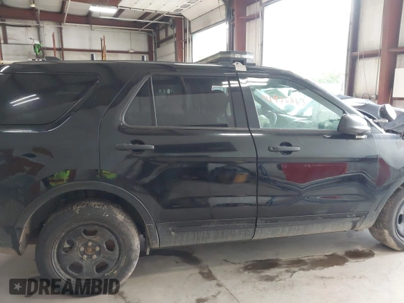 2018 Ford Police Interceptor Utility z VIN 1FM5K8AR5JGB91950, wystawiony jako IAAI lot #41976863 z przebiegiem Nie podano mil oraz . Historia ofert i sprzedaży dostępna na DreamBid. Obrazek 13.