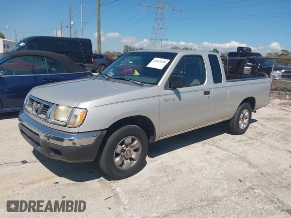 1999 Nissan Frontier XE z VIN 1N6DD26S4XC337030, wystawiony jako IAAI lot #41683250 z przebiegiem 143 765 mil mil oraz . Historia ofert i sprzedaży dostępna na DreamBid. Obrazek 2.