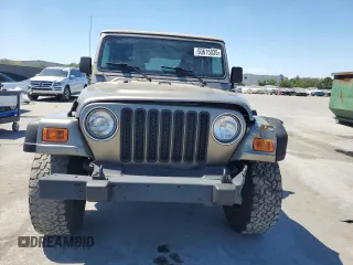 2002 Jeep Wrangler Sport with VIN 1J4FA49S72P765939, listed as a Copart auction lot 50615035 with 210,516 mi miles and Salvage Title. Bid and sale history available at carsss.com. Image 5.