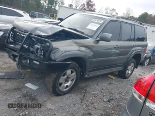 2001 Toyota Land Cruiser with VIN JTEHT05J012004269, listed as a IAAI auction lot 41037545 with 180,814 mi miles. Bid and sale history available at carsss.com. Image 2.