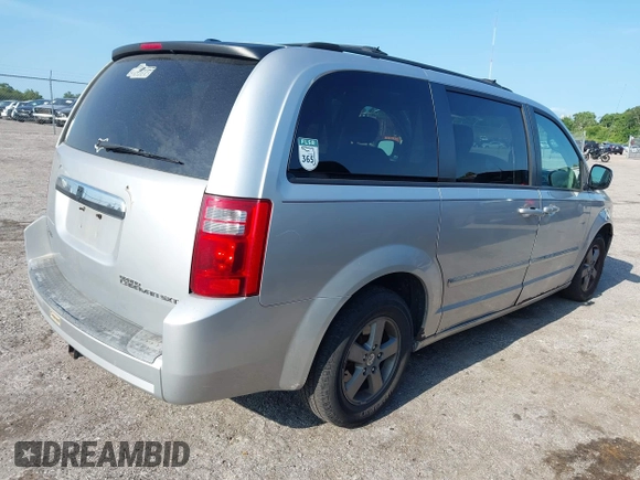 2009 Dodge Grand Caravan SXT z VIN 2D8HN54189R671683, wystawiony jako IAAI lot #42350455 z przebiegiem 220 306 mil mil oraz . Historia ofert i sprzedaży dostępna na DreamBid. Obrazek 4.