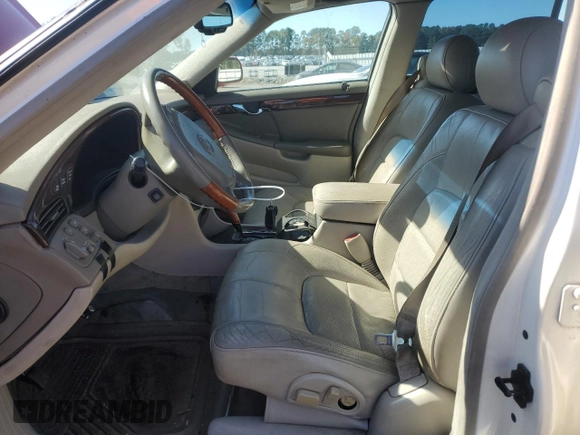 2002 Cadillac DeVille DTS with VIN 1G6KF57942U231877, listed as a Copart auction lot 76724554 with 180,082 mi miles and Salvage Title. Bid and sale history available at carsss.com. Image 7.